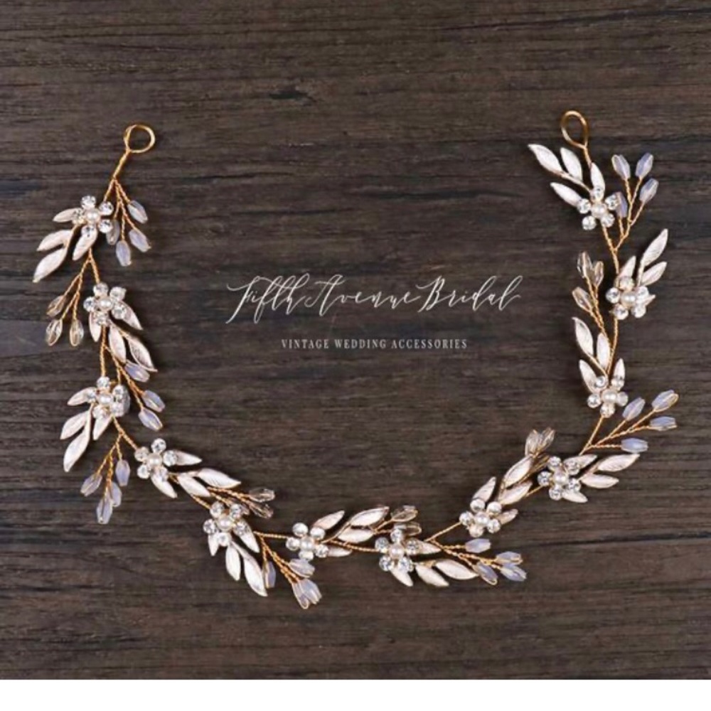 Gold bridal headband or halo.